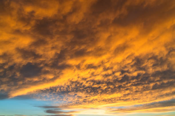 Sunrise with cloud filled sky over Woy Woy on the Central Coast, NSW, Australia.