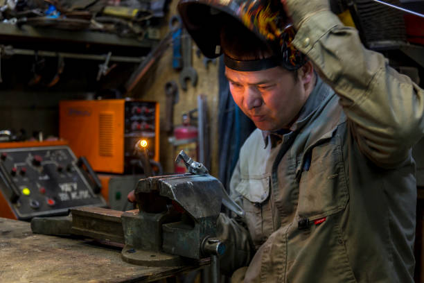 istock Close-up portrait of a welder in the workplace 1372485607
