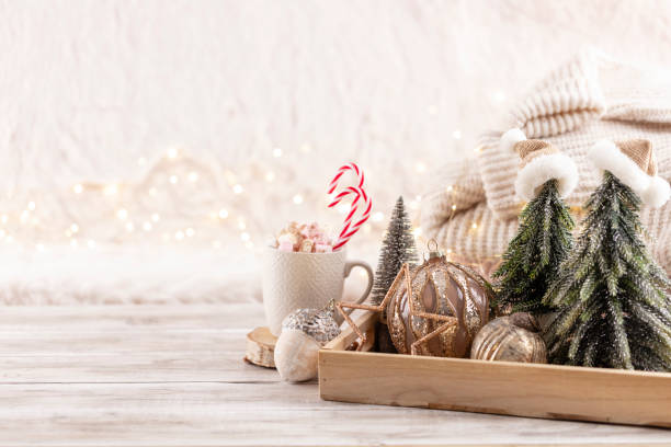 istock Cup with a hot drink, marshmallow on a table with christmas decorations. 1372485927