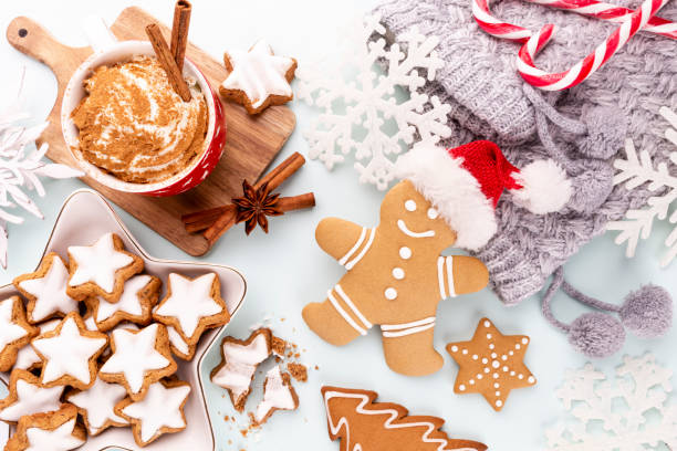 istock Gingerbread man, cookies and Christmas decor on pastel background. 1372486003