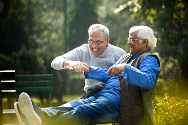 istock Two senior men having fun at park 1372487176