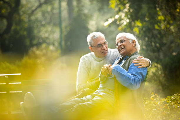 istock Two senior men having fun at park 1372487238