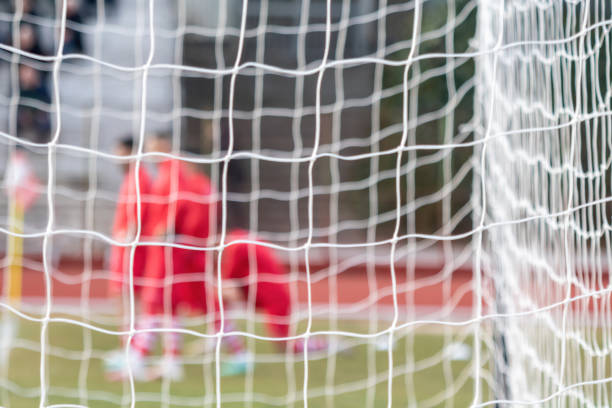 istock Athletic concept. Soccer nets with knots white color 1372487262