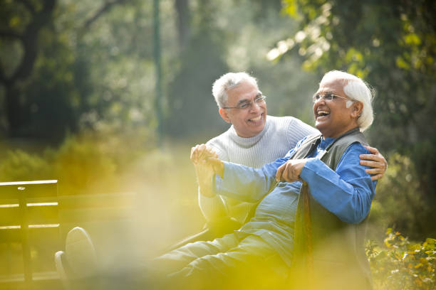 istock Two senior men having fun at park 1372487322