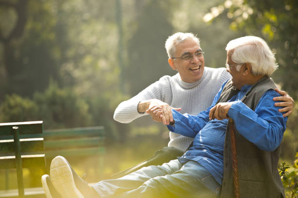 istock Two senior men having fun at park 1372487343