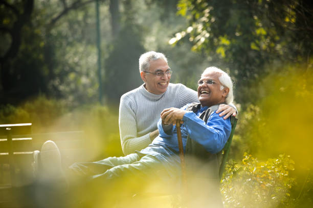 istock Two senior men having fun at park 1372487386