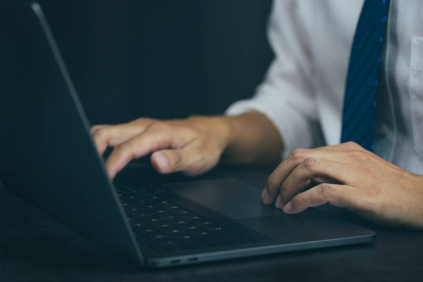 istock Businessman typing keyboard on laptop or computer. 1372488407