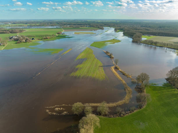 istock Vecht river high water level flooding at the Junne weir drone view 1372489688