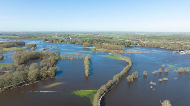 istock Vecht river high water level flooding at the Vilsteren weir drone view 1372489730