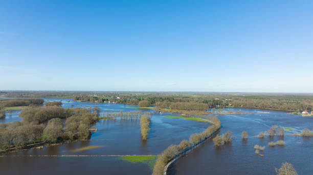 istock Vecht river high water level flooding at the Vilsteren weir drone view 1372489951