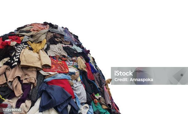 Large Pile Stack Of Textile Fabric Clothes And Shoes Concept Of Recycling Up Cycling Awareness To Global Climate Change Fashion Industry Pollution Sustainability Reuse Of Garment Stock Photo - Download Image Now