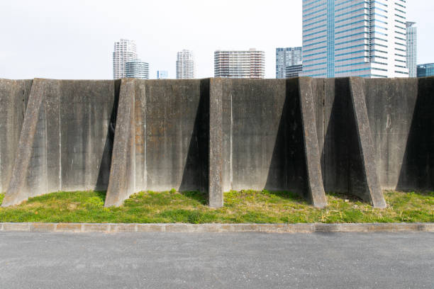 콘크리트 벽 - waterbreak fortified wall nobody outdoors 뉴스 사진 이미지