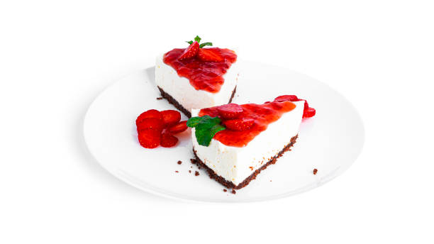 istock Cheesecake with strawberry isolated on a white background. Cheesecake on plate 1372501153
