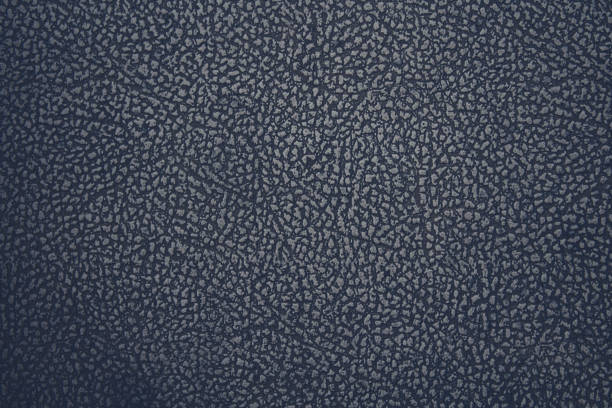 istock Old black leatherette. Artificial leather. Close-up. Background. Texture. 1372502684
