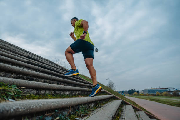 istock Mature man exercising outdoors 1372503570