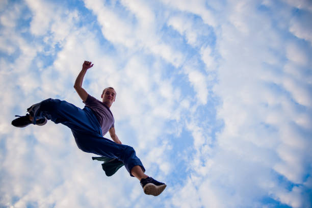 istock Parkour man doing tricks in the air 1372503648