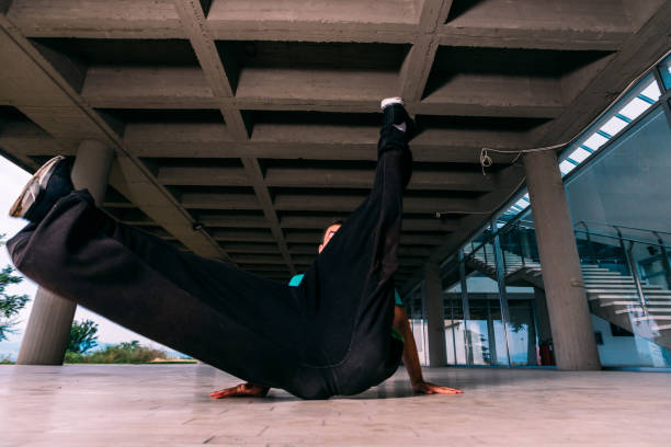 istock Parkour guy exercising parkour at urban place 1372503702
