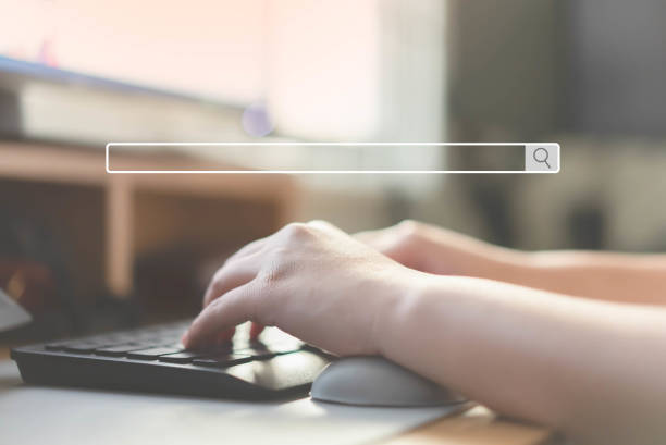 istock Close up of human hand typing on computer keyboard as background of search engine browser 1372503735
