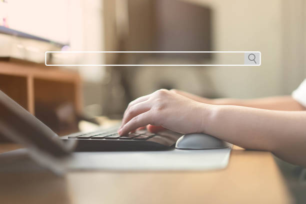 istock Close up of human hand typing on computer keyboard as background of search engine browser 1372503743