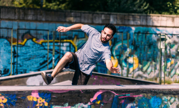 istock Handsome man train parkour at urban place 1372503747