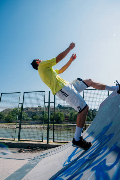istock Parkour guy training on obstacles in skatepark 1372503752