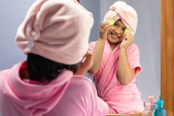 istock Girl child in pink bathrobe 1372505617