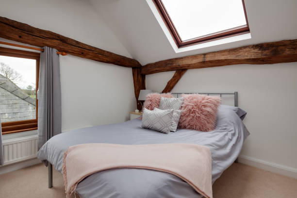 istock Stunning bright white chic attic style bedroom 1372505794