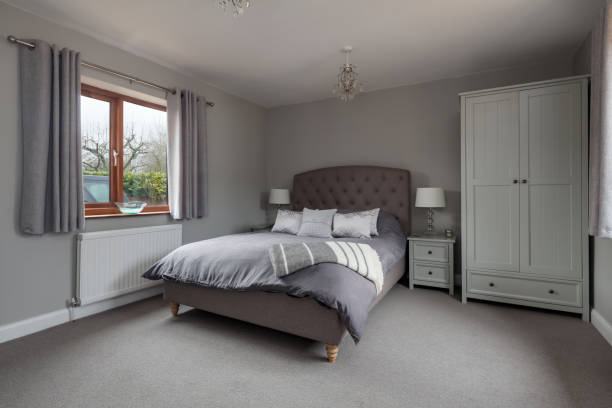istock Grey and white luxury bedroom 1372505823