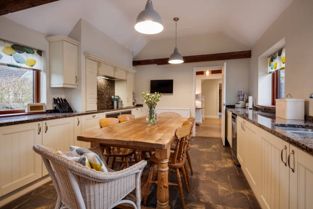 istock Traditional styled luxury kitchen with prominent wood table 1372505908