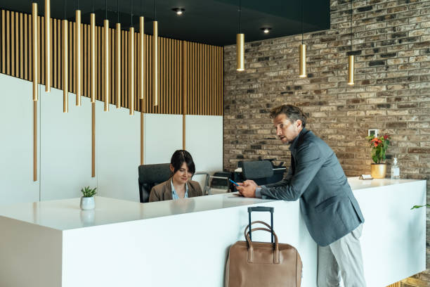 istock Handsome Business Man Checking In at Hotel 1372506161