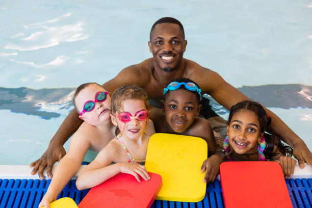 istock A Happy Group of Young Swimmers 1372507100