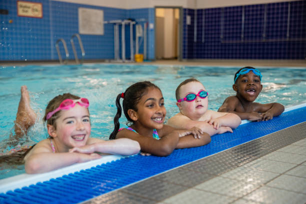 istock Making Friends at Swim Class 1372510895