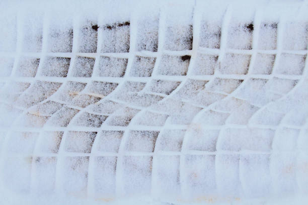 istock Car track in the snow. Close-up. Top view. Background. Texture. 1372511238