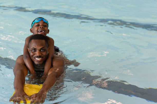 istock Swimming With My Son 1372512658