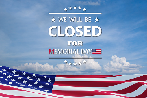 Memorial Day Background Design. American flag on a background of blue sky with a message. We will be Closed for Memorial Day. 3d rendering.