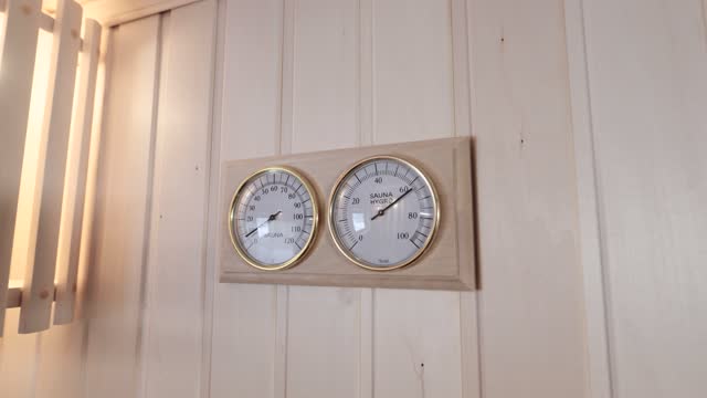 Thermometer and hygrometer in the sauna. Temperature and humidity control is important during bath procedures