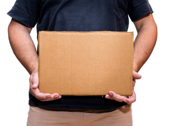 istock Man holding blank cardboard sign. 1372521186