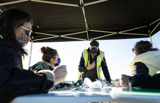 istock Rescue team chief explaining and giving instructions about a new operation at the airfield. 1372521332