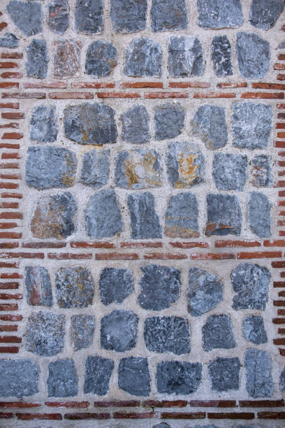 old stone wall of ancient building