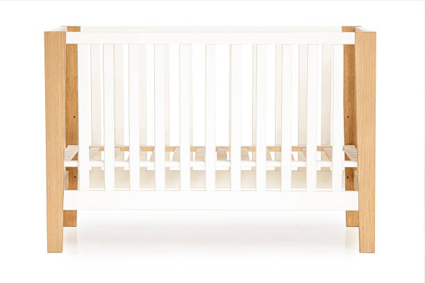 istock wooden baby bed isolated on white background 1372529084