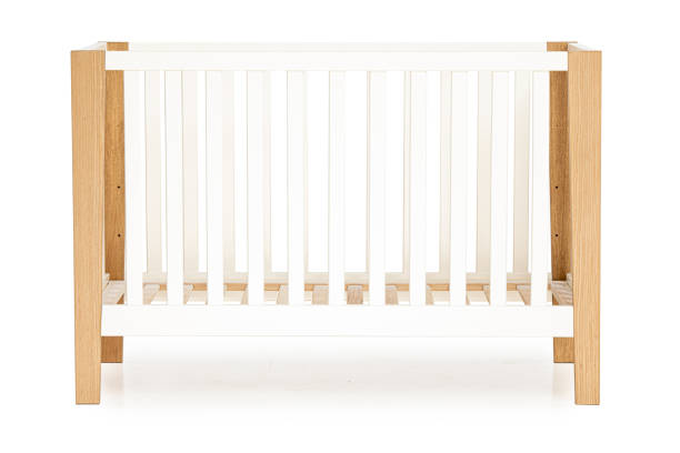 istock wooden baby bed isolated on white background 1372529101