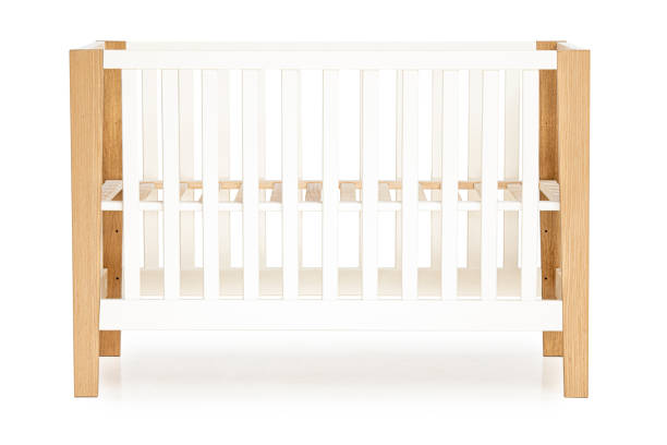 istock wooden baby bed isolated on white background 1372529102