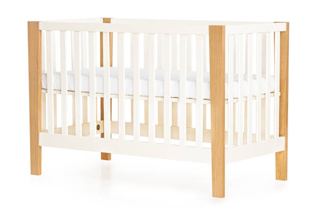 istock wooden baby bed isolated on white background 1372529117