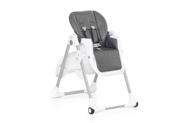 istock baby high chair side view studio shot in white background 1372529135