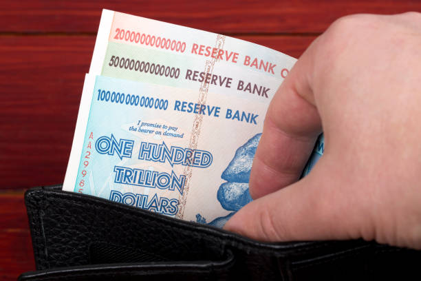 istock Old Zimbabwean banknotes in the black wallet 1372529302