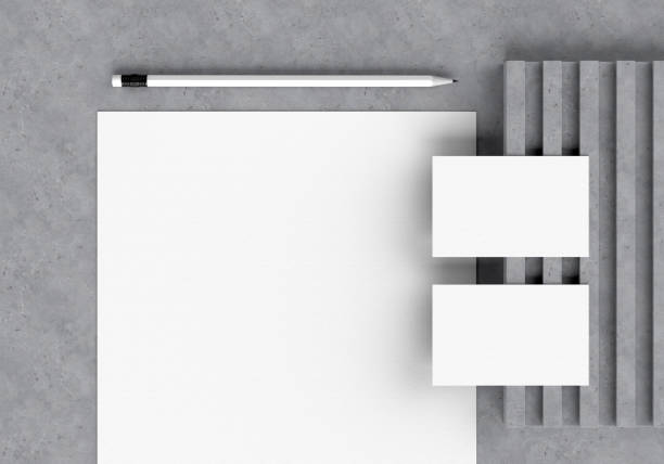 istock Base white stationery mockup template for branding identity on a gray concrete background for graphic designers presentations and portfolios. 3D rendering. 1372532385