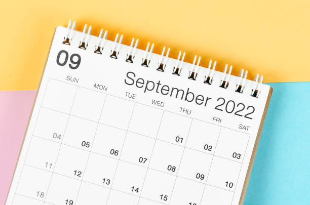 istock September 2022 desk calendar on multicolored background. 1372534231