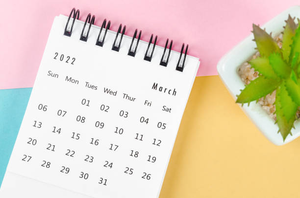 istock March 2022 desh calendar on multicolored background. 1372534278