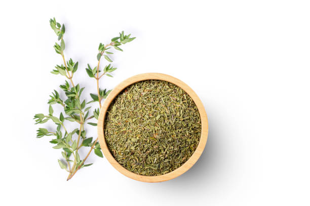 Fresh and dry Thyme leaf isolated on white Fresh and dry Thyme leaf isolated on white background. Top view. Flat lay. condiment stock pictures, royalty-free photos & images