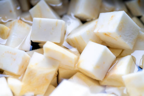 Cubed celeriac in water.